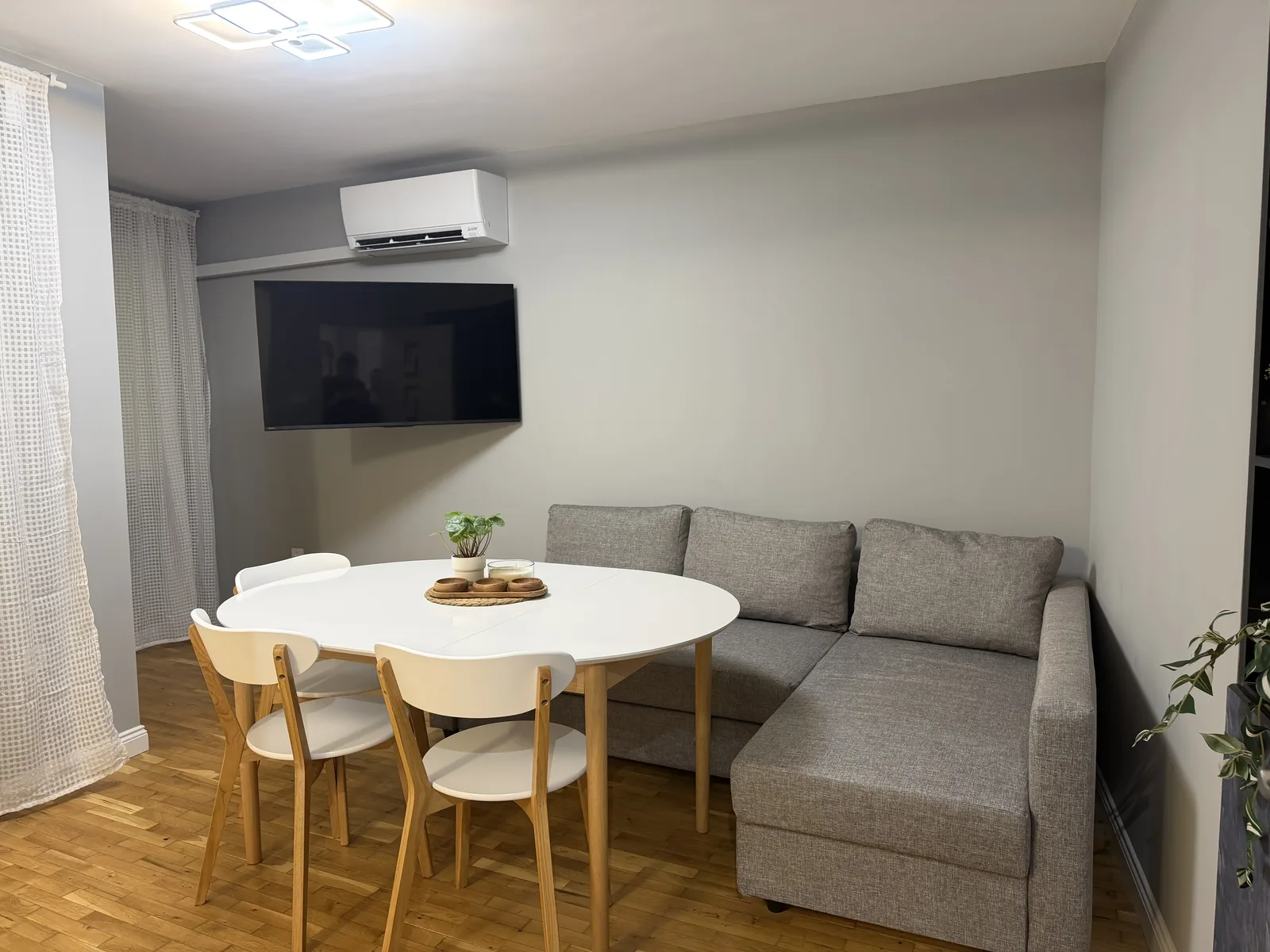 Living room with sofa and dining table