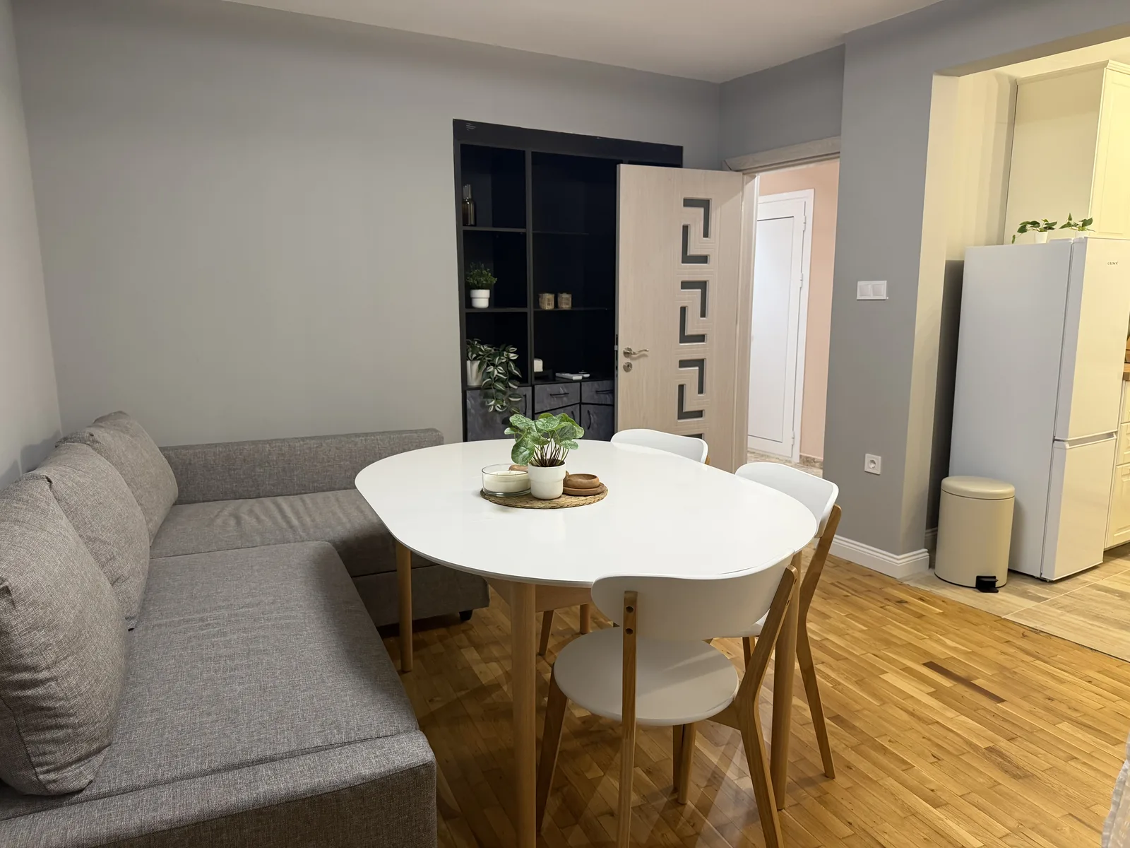 Open-plan living room looking towards the kitchen