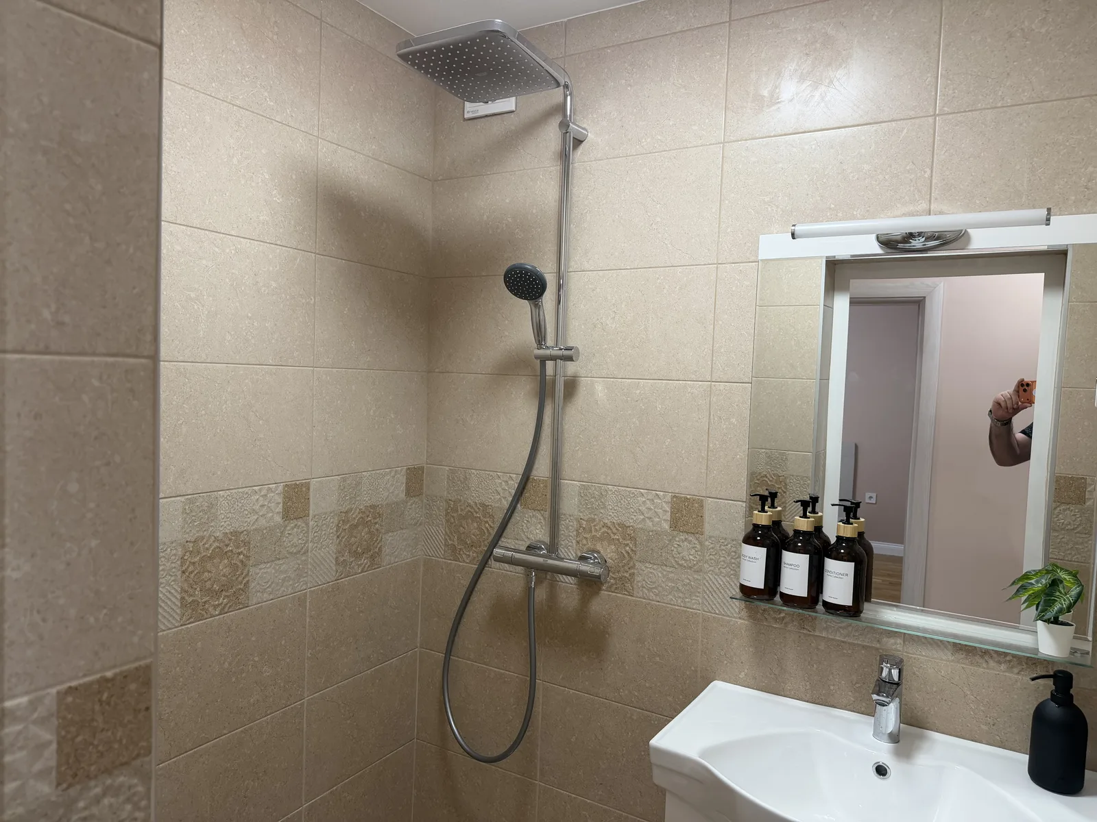 Bathroom with shower and sink