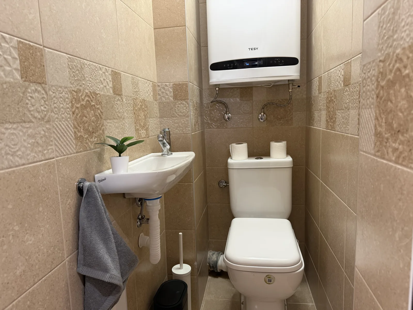 Separate toilet with its own sink